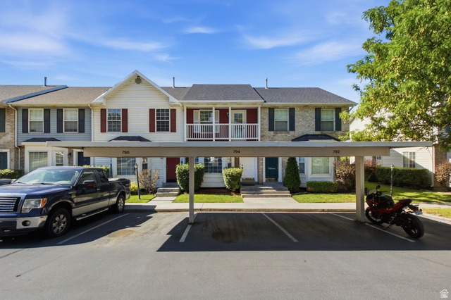794 East 950 S Street Provo, UT 84606 - Photo 4 of 28 Multi-level townhome featuring a carport with designated parking