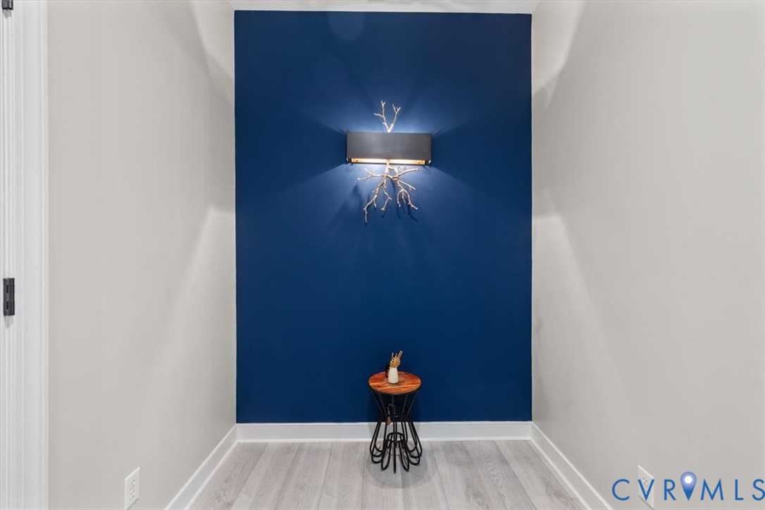 402 Rivers Bend Circle Chester, VA 23836 - Photo 56 of 80 a room with a table and a lamp