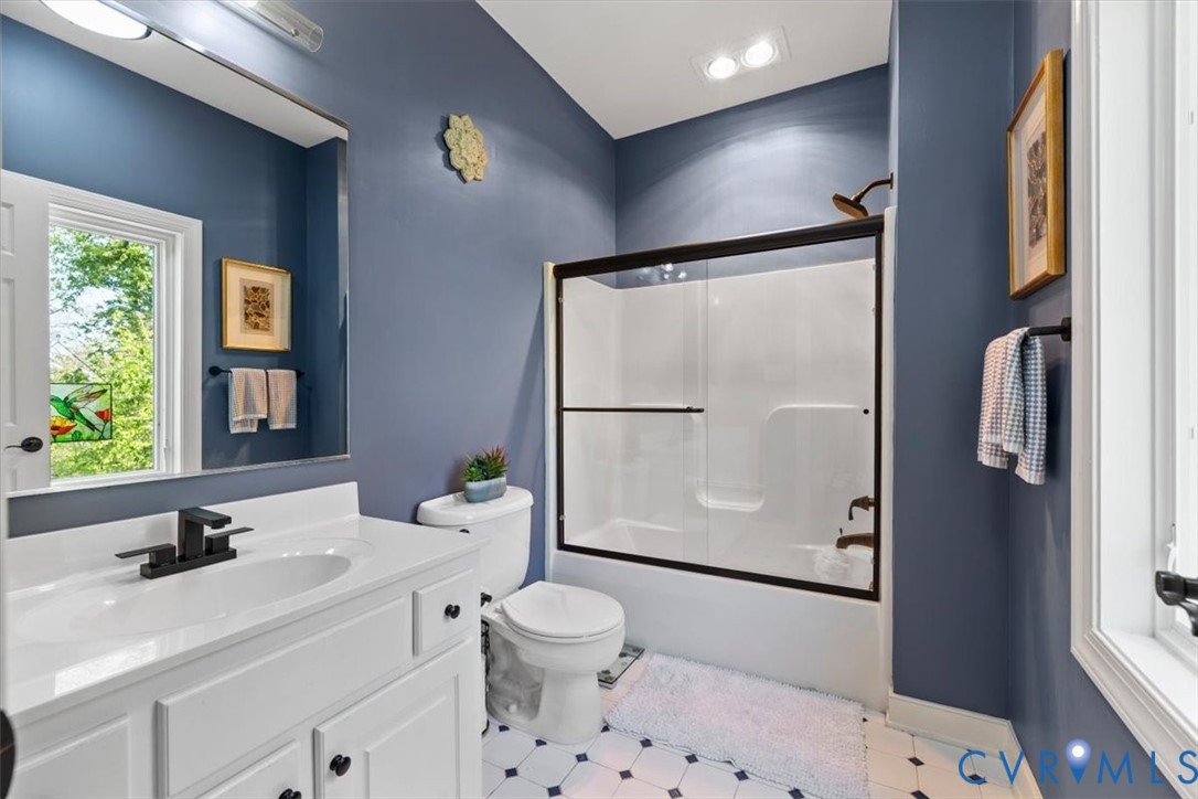 402 Rivers Bend Circle Chester, VA 23836 - Photo 63 of 80 a bathroom with a sink toilet and shower
