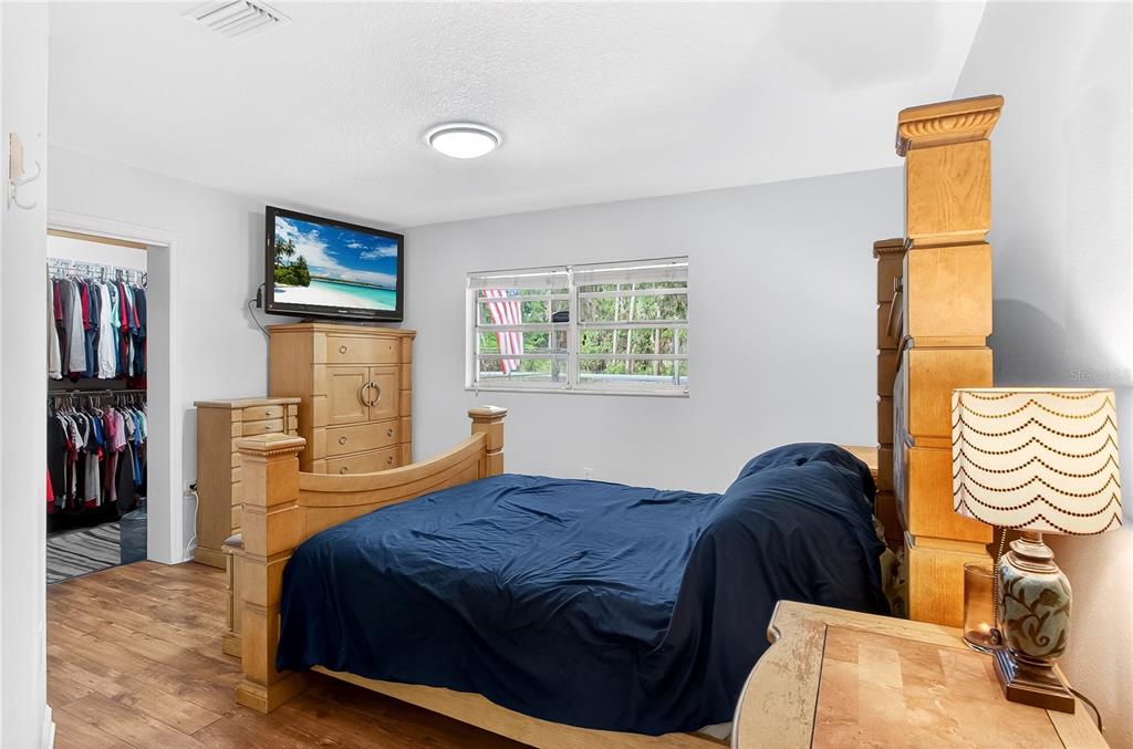 5304 Tillman Road Lakeland, FL 33810 - Photo 15 of 33 a bedroom with a bed and a television