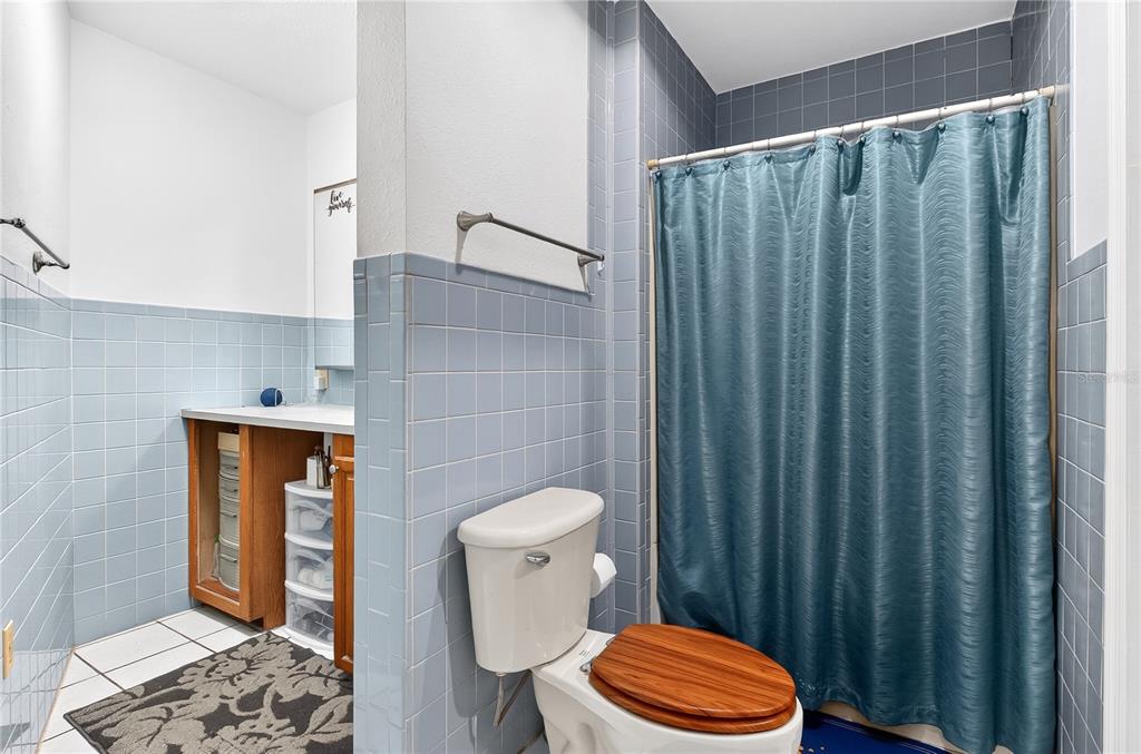 5304 Tillman Road Lakeland, FL 33810 - Photo 18 of 33 a bathroom with a toilet a sink and shower