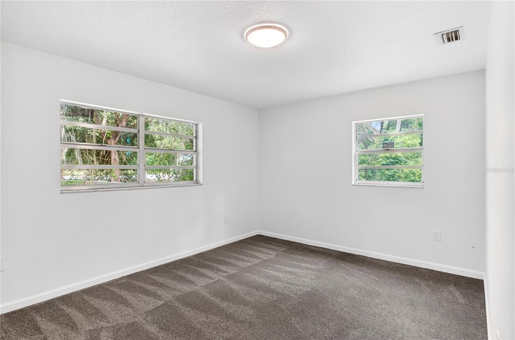 5304 Tillman Road Lakeland, FL 33810 - Photo 21 of 33 an empty room with windows