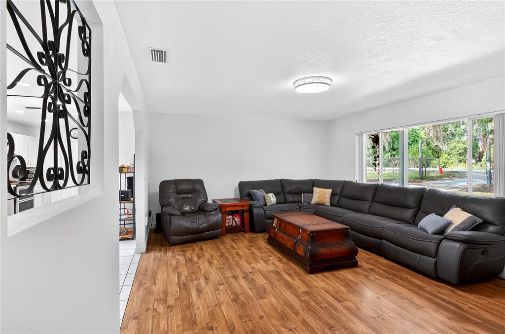 5304 Tillman Road Lakeland, FL 33810 - Photo 6 of 33 a living room with furniture and a large window