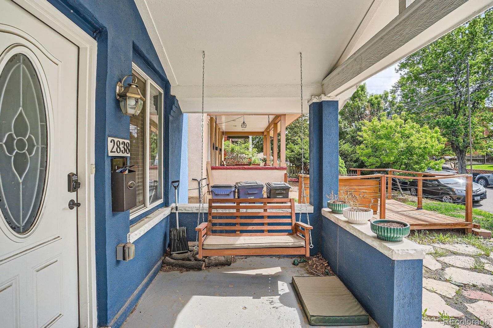 2838 Decatur Street Denver, CO 80211 - Photo 4 of 31 a view of a balcony with chairs