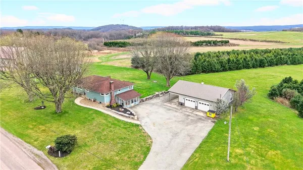 a view of a lake with a yard