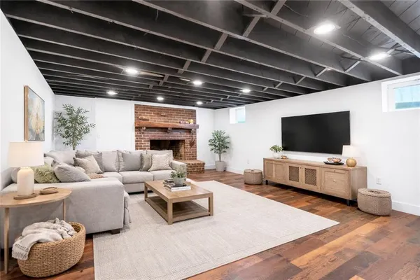 a large white kitchen with cabinets