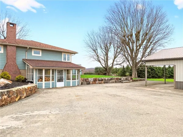 a view of a backyard with a garden