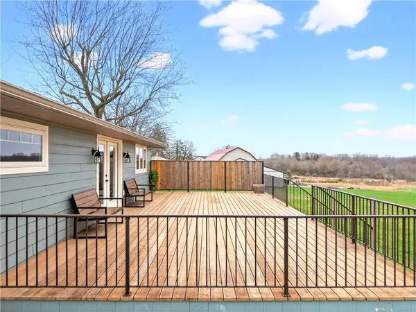 a view of a field with an trees