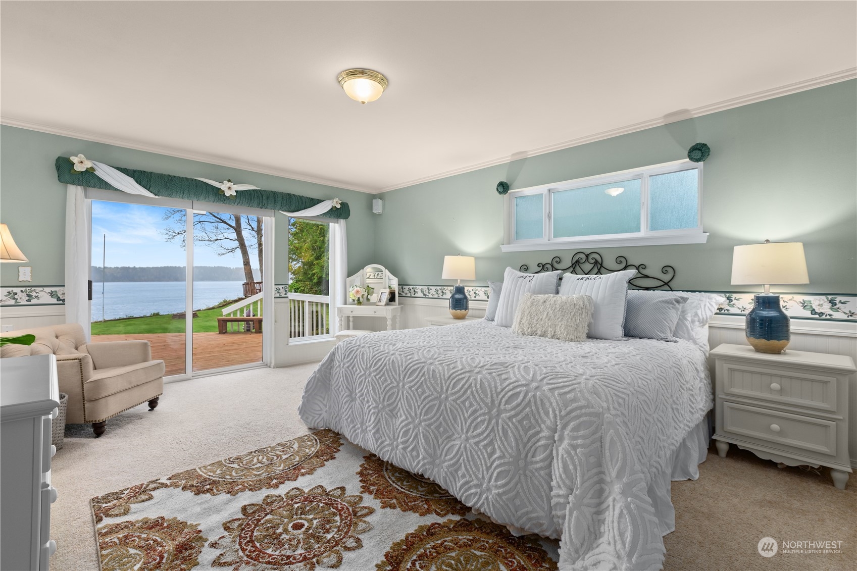 8230 Shoemaker Road Marysville, WA 98271 - Photo 13 of 40 a bedroom with a bed and a large window with outer view