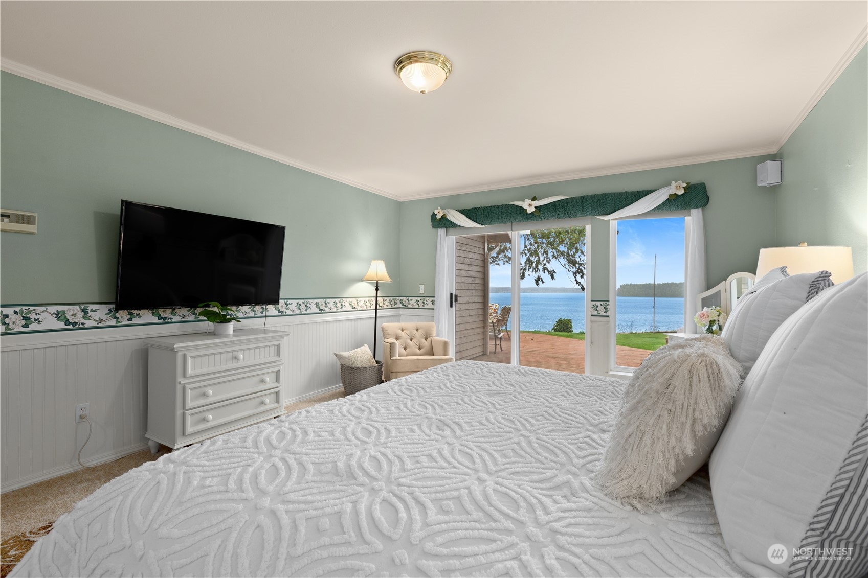 8230 Shoemaker Road Marysville, WA 98271 - Photo 14 of 40 a bedroom with a bed and a flat screen tv