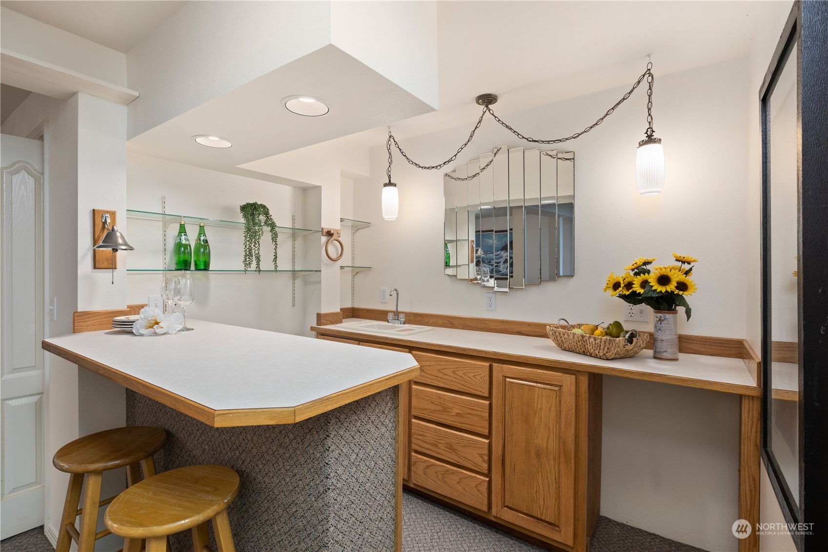 8230 Shoemaker Road Marysville, WA 98271 - Photo 27 of 40 a kitchen with sink cabinets and window