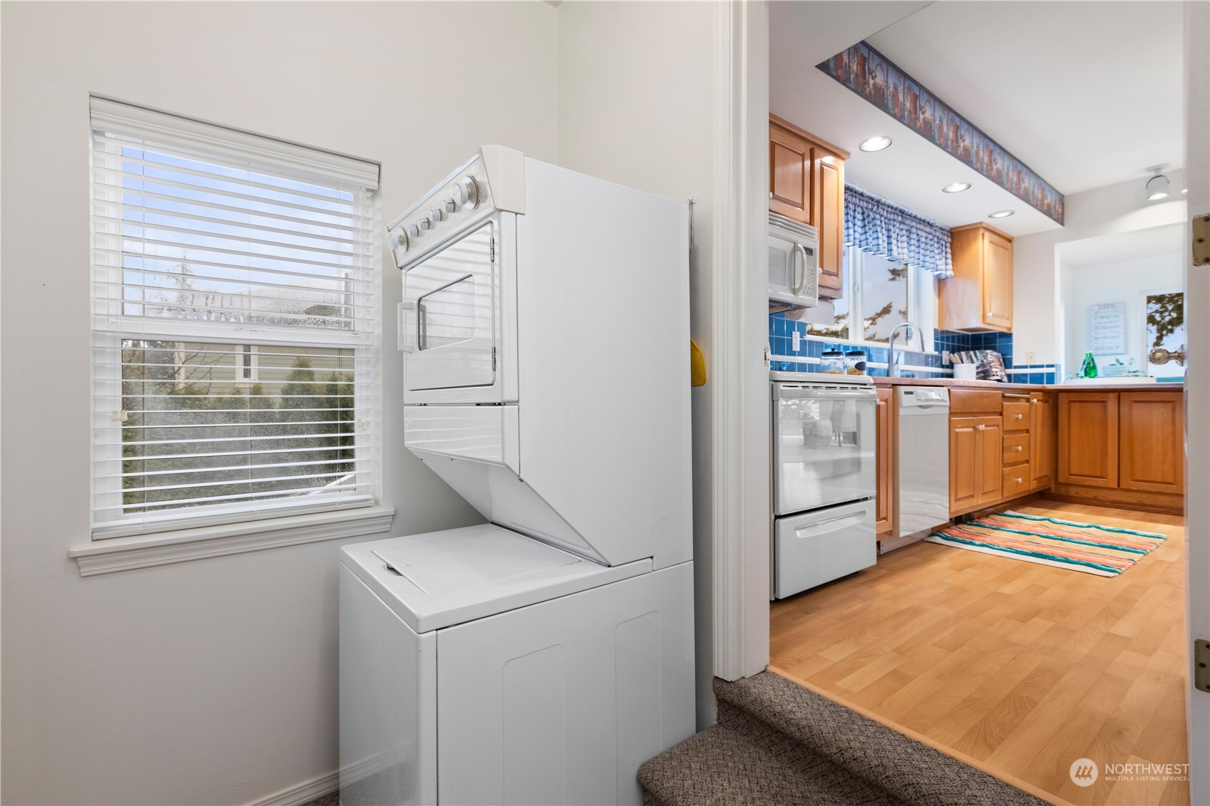 8230 Shoemaker Road Marysville, WA 98271 - Photo 28 of 40 a kitchen with cabinets and window