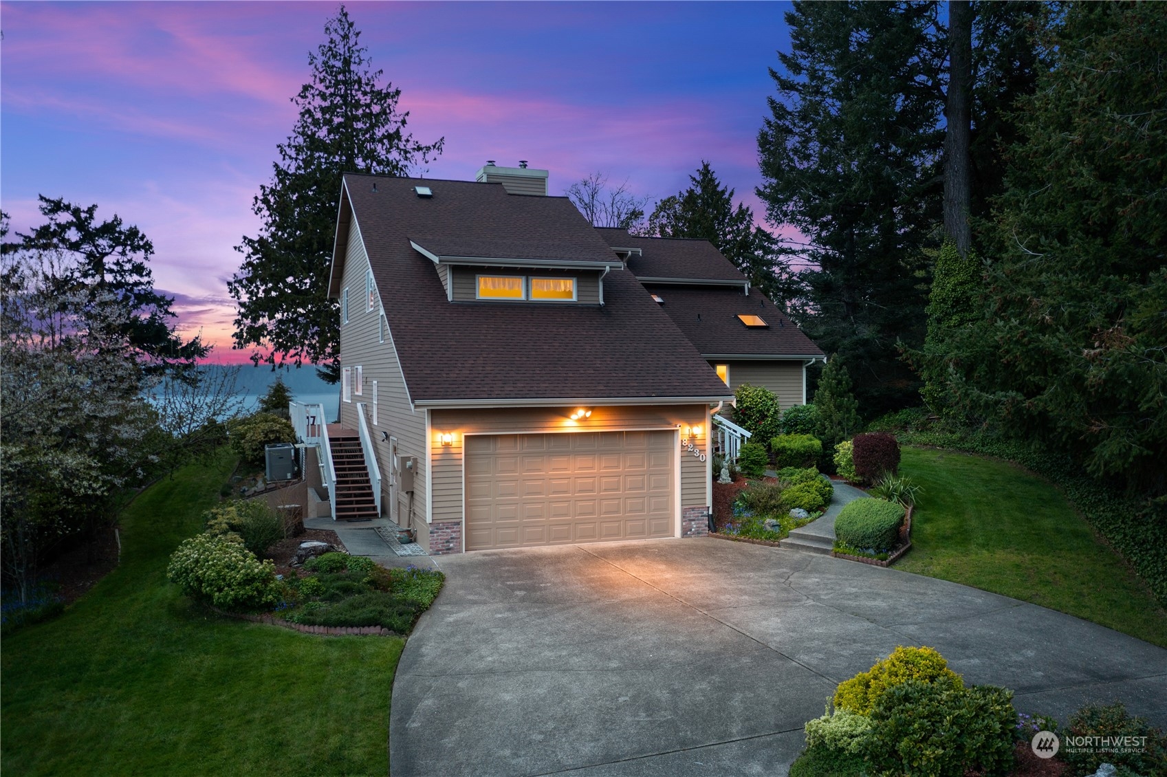 8230 Shoemaker Road Marysville, WA 98271 - Photo 3 of 40 a front view of a house with a yard and garage