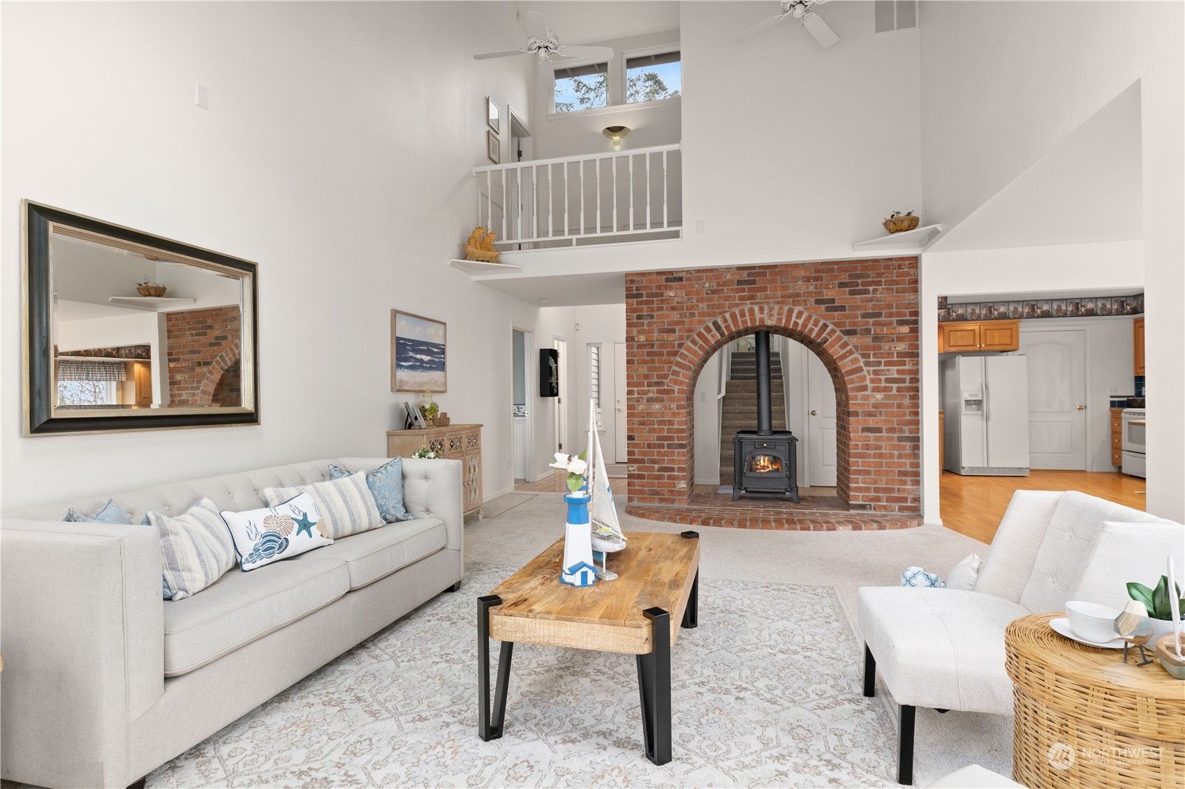 8230 Shoemaker Road Marysville, WA 98271 - Photo 7 of 40 a living room with furniture and a fireplace