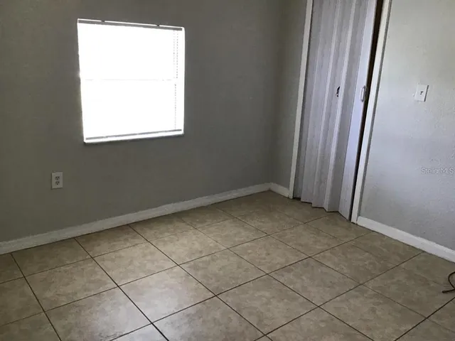 an empty room with a window