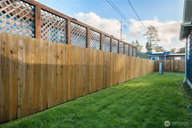 a view of a wooden fence