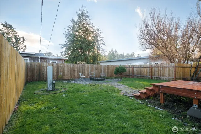 a backyard of a house with lots of green space