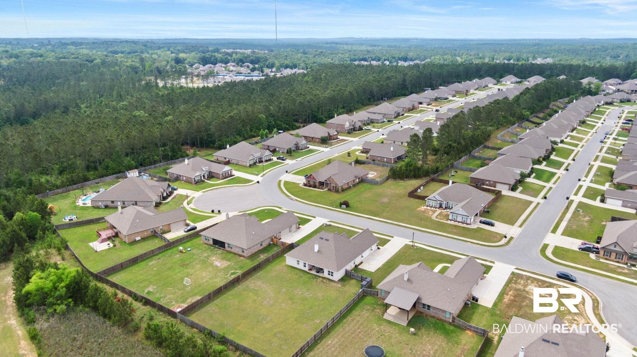 31187 Spoonbill Road Daphne, AL 36527 - Photo 80 of 85 Residential subdivision featuring single-story homes with attached garages, paved streets, and individual fenced yards