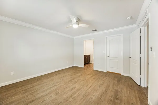 a bathroom with a sink a mirror and vanity