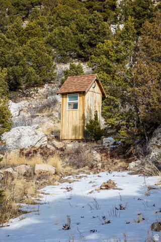 18906 North Canyon Road Whiterocks, UT 84085 - Photo 56 of 65 Snow covered structure with a shed
