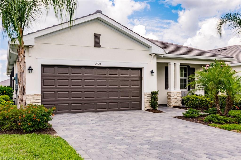 2247 Dancy Street Naples, FL 34120 - Photo 2 of 32 a view of house with backyard