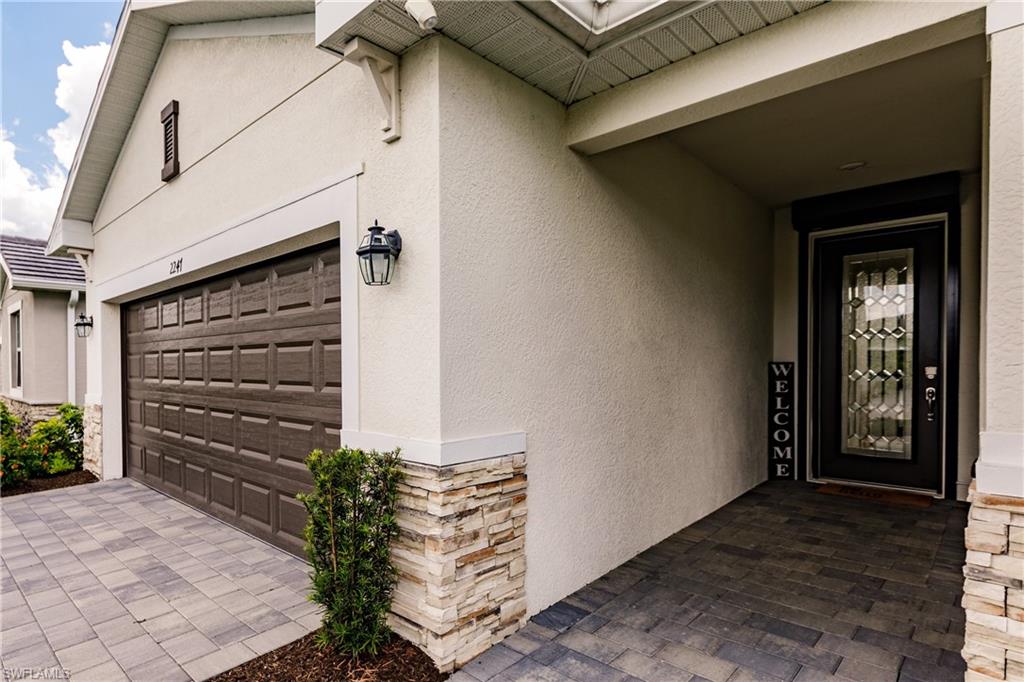 2247 Dancy Street Naples, FL 34120 - Photo 3 of 32 a view of entryway with a front door