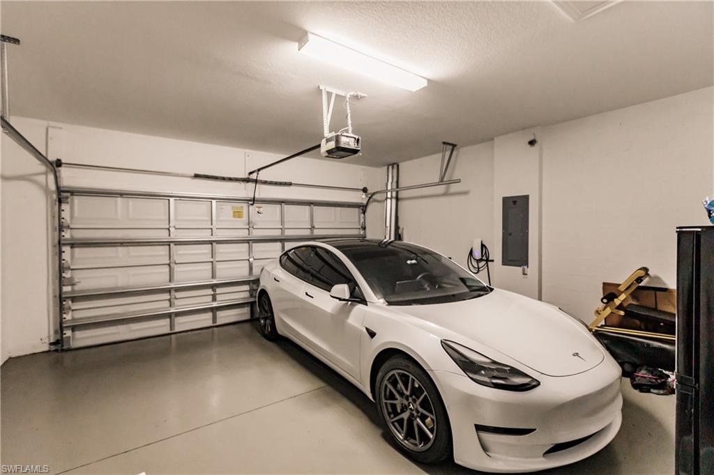 2247 Dancy Street Naples, FL 34120 - Photo 32 of 32 a utility room with dryer and washer