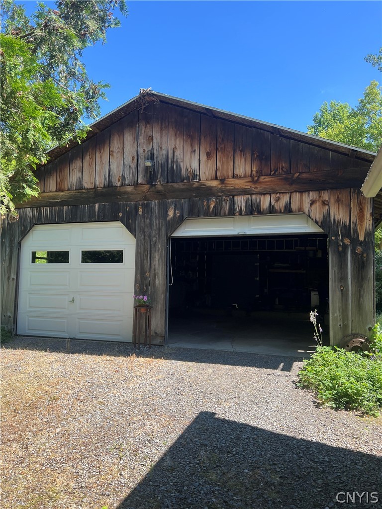 2778 Otisco Valley Road Marcellus, NY 13110 - Photo 5 of 44 Large garage with electric and new doors in 2020