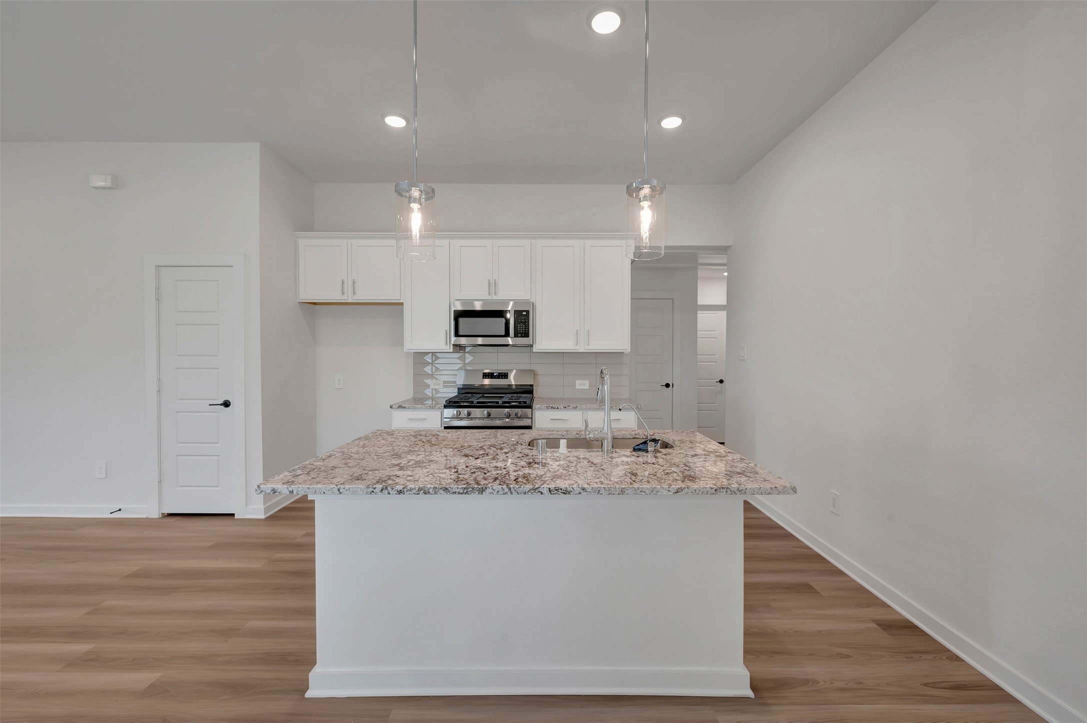 759 Hackberry Branch Magnolia, TX 77354 - Photo 16 of 43 a room with wooden floor and entryway