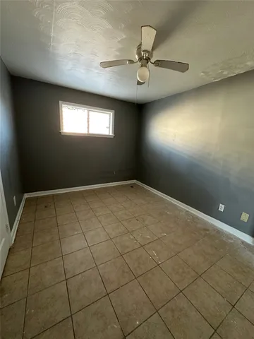 en empty room with windows