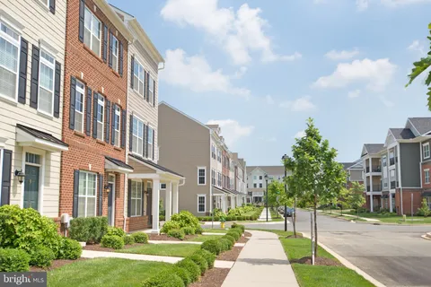 a view of a building with a yard