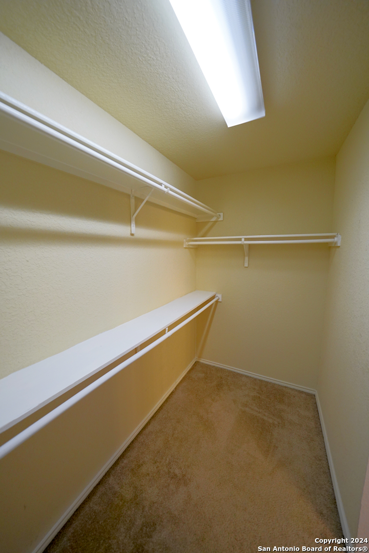 523 Diana Drive Converse, TX 78109 - Photo 27 of 50 a view of a room with racks on the wall