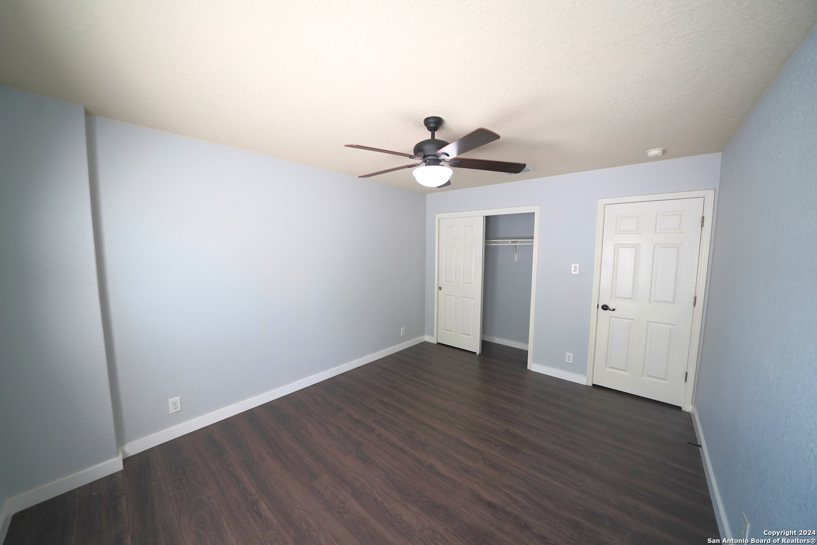 523 Diana Drive Converse, TX 78109 - Photo 40 of 50 a view of an empty room with a window and a fan