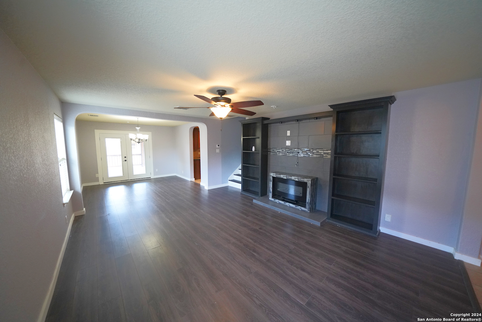 523 Diana Drive Converse, TX 78109 - Photo 8 of 50 a view of a livingroom with a fireplace wooden floor and fire place