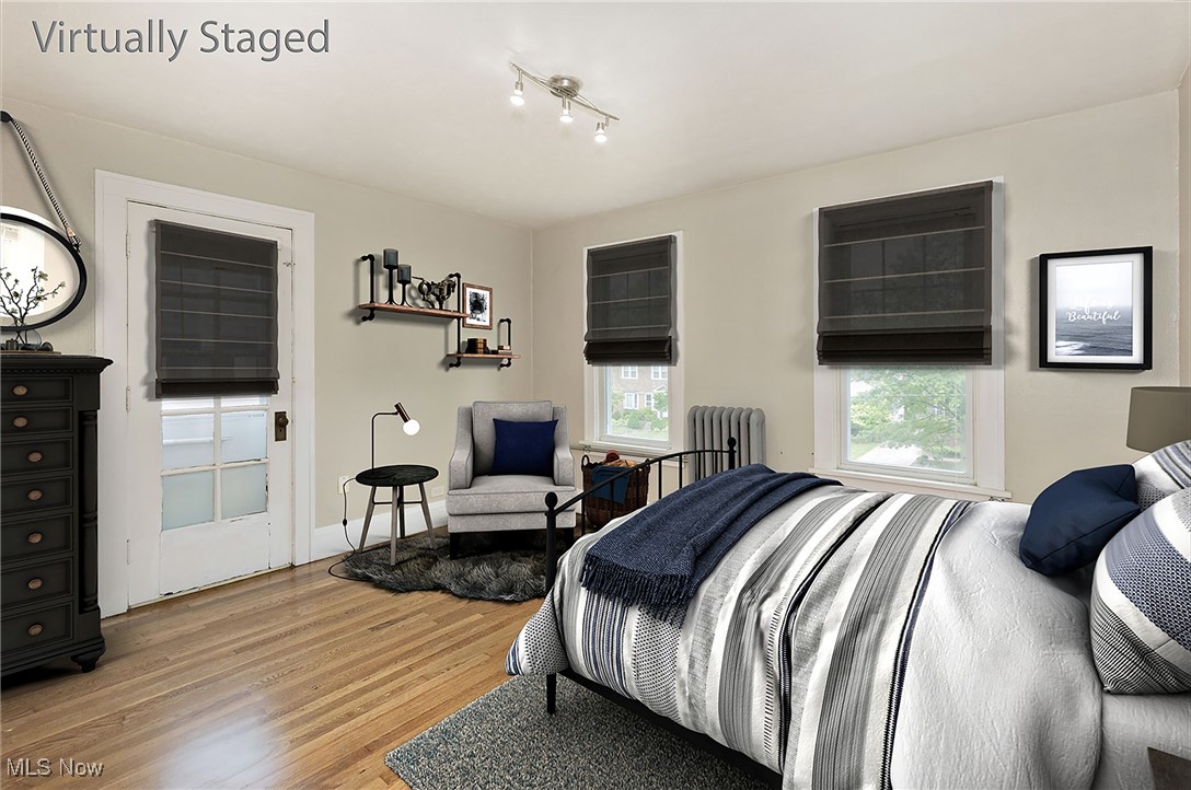3366 Clarendon Road Cleveland, OH 44118 - Photo 24 of 50 This is a nice rendering of what personal touches may look like in the bedroom that opens to the 2nd floor balcony.