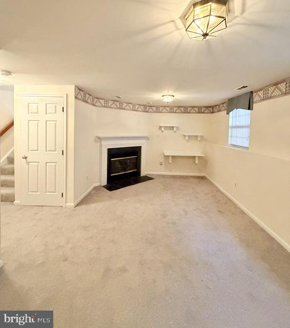 45572 Whitcomb Square Sterling, VA 20166 - Photo 25 of 32 Cozy basement retreat with fireplace.