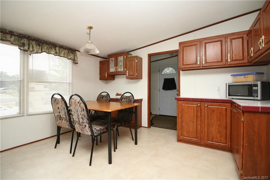 34927 Finger Road Mount Pleasant, NC 28124 - Photo 6 of 19 a dining room with furniture and window