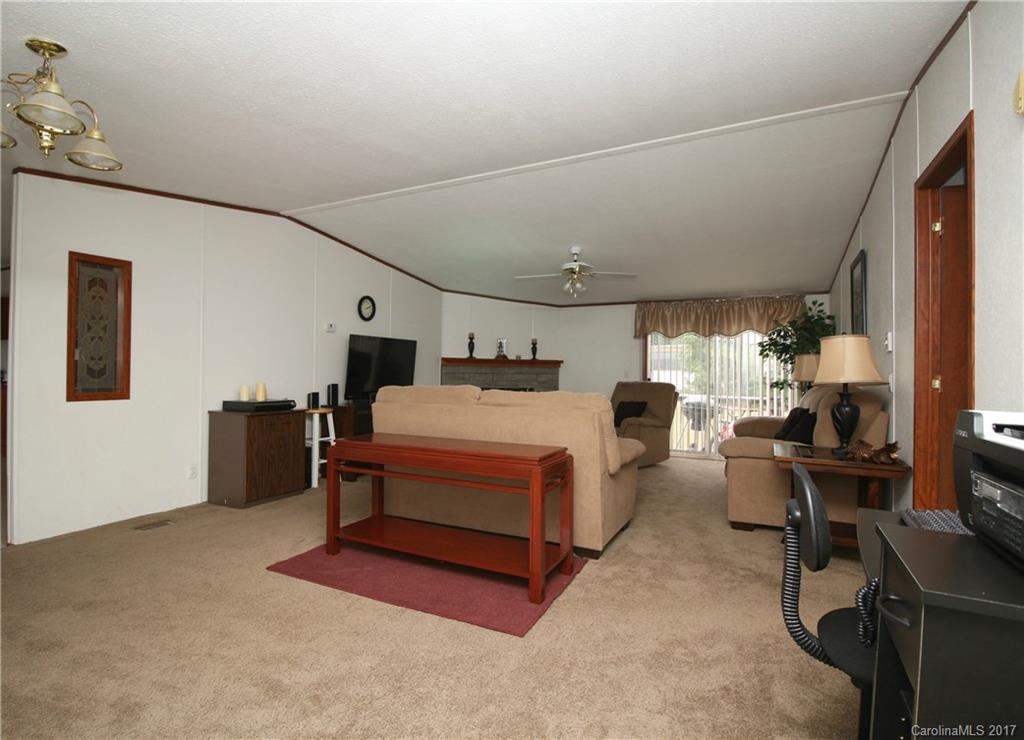 34927 Finger Road Mount Pleasant, NC 28124 - Photo 7 of 19 a bed room with a bed and a chair