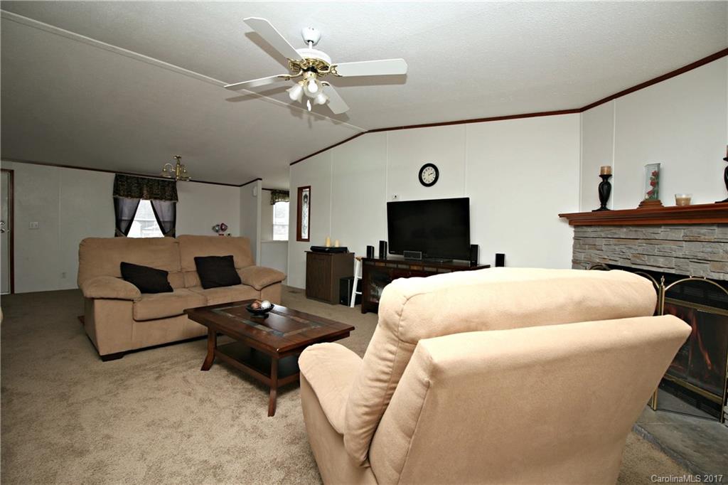34927 Finger Road Mount Pleasant, NC 28124 - Photo 9 of 19 a bed room with a bed and a television