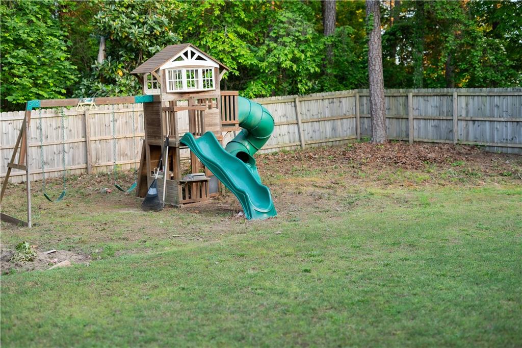 3830 Kittery Point Southwest Snellville, GA 30039 - Photo 35 of 35 a view of a park with a fence