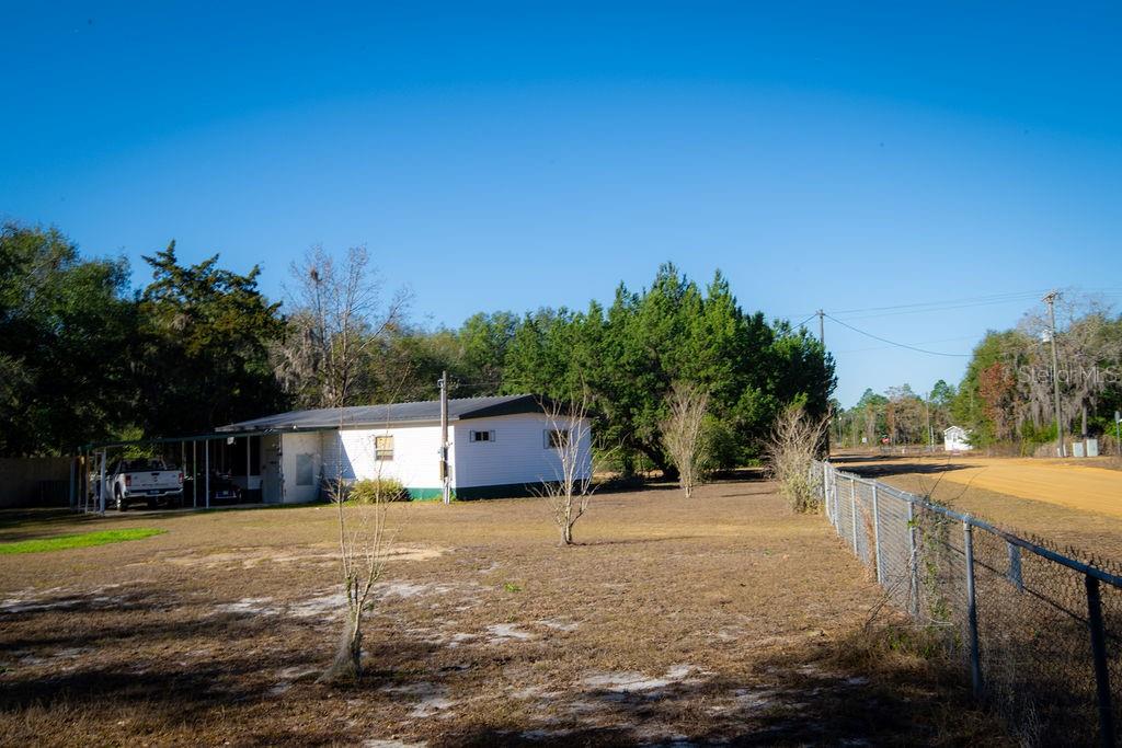 240 Kitty Avenue Interlachen, FL 32148 - Photo 34 of 44 a house view with a backyard space
