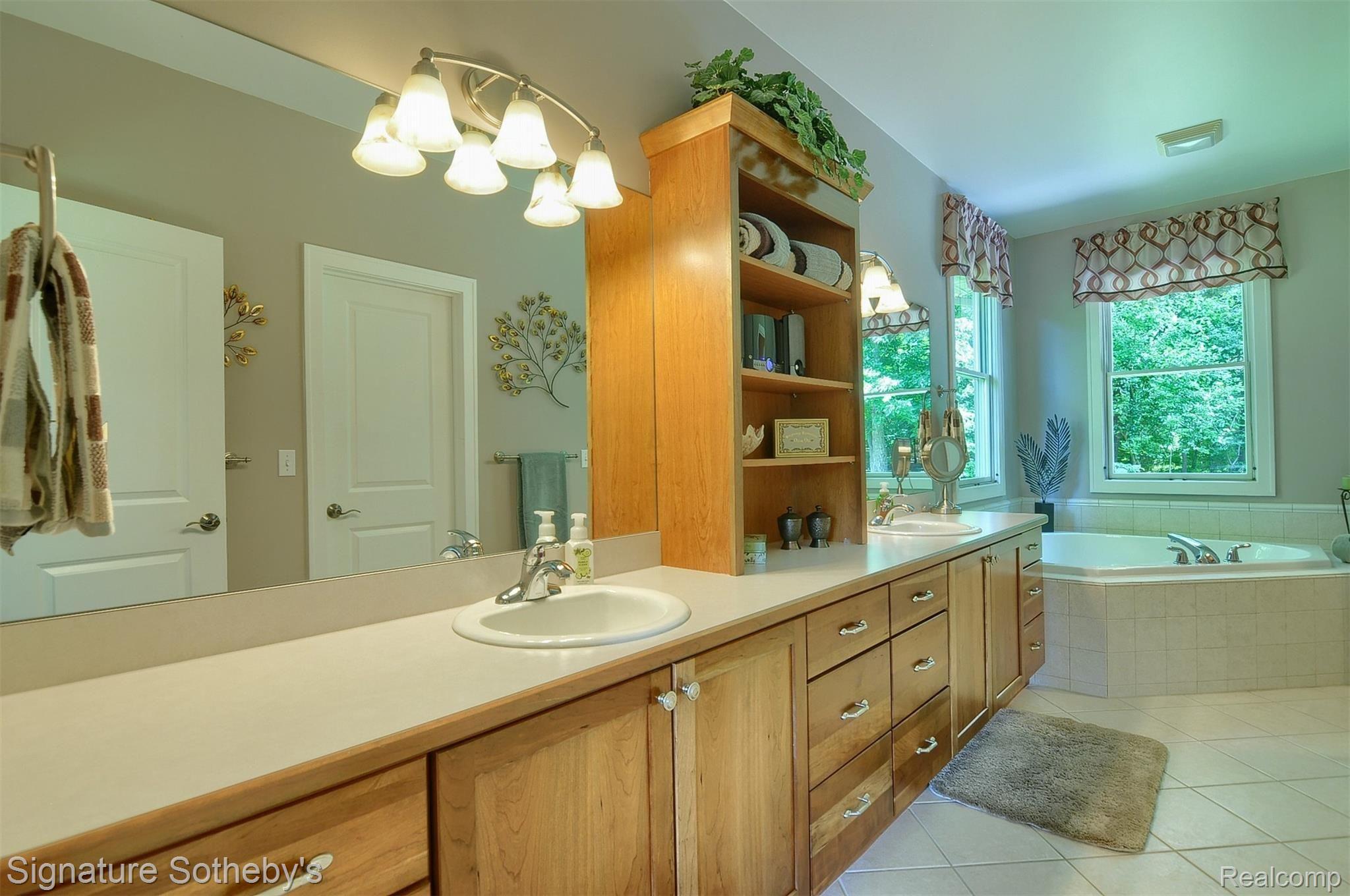 12293 Ivy Lane Fenton, MI 48430 - Photo 18 of 43 Master Bath Cherry Cabinetry and heated floors