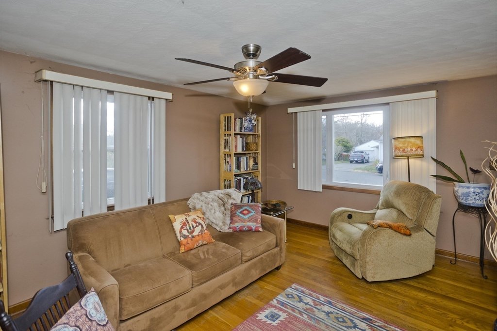 27 Regal Street Springfield, MA 01118 - Photo 14 of 32 a living room with furniture and a ceiling fan