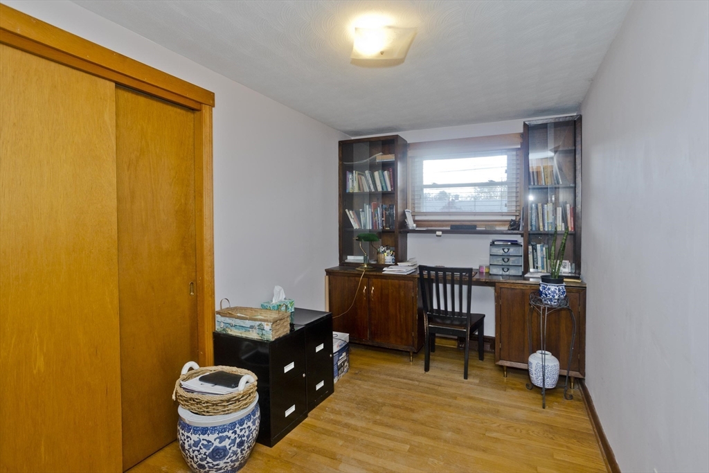 27 Regal Street Springfield, MA 01118 - Photo 19 of 32 a living room with furniture and a potted plant