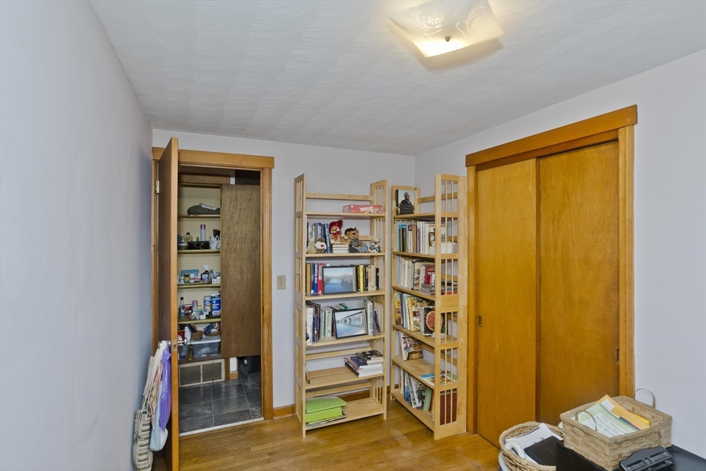 27 Regal Street Springfield, MA 01118 - Photo 21 of 32 a view of a livingroom with furniture and a window