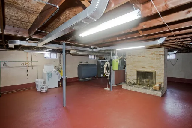 a view of empty room with wooden ceiling