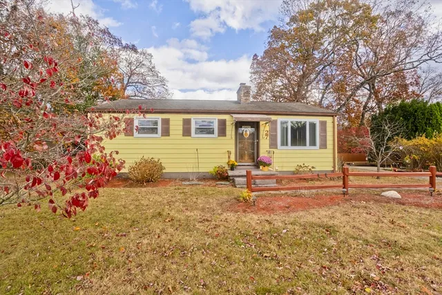 front view of house with a yard