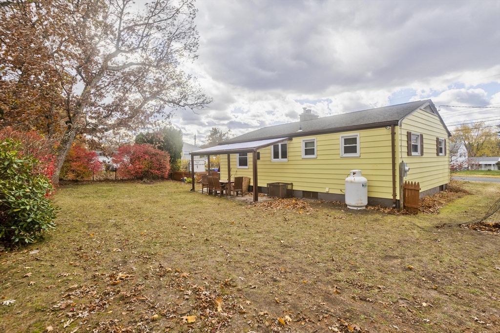 27 Regal Street Springfield, MA 01118 - Photo 30 of 32 a front view of a house with a yard