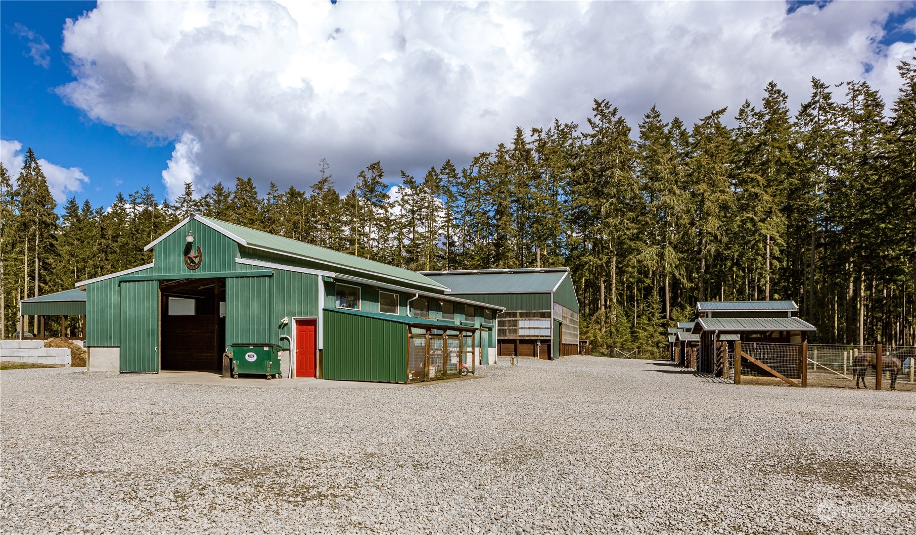 4656 Monkey Hill Road Oak Harbor, WA 98277 - Photo 20 of 40 a view of a house with a yard and sitting area