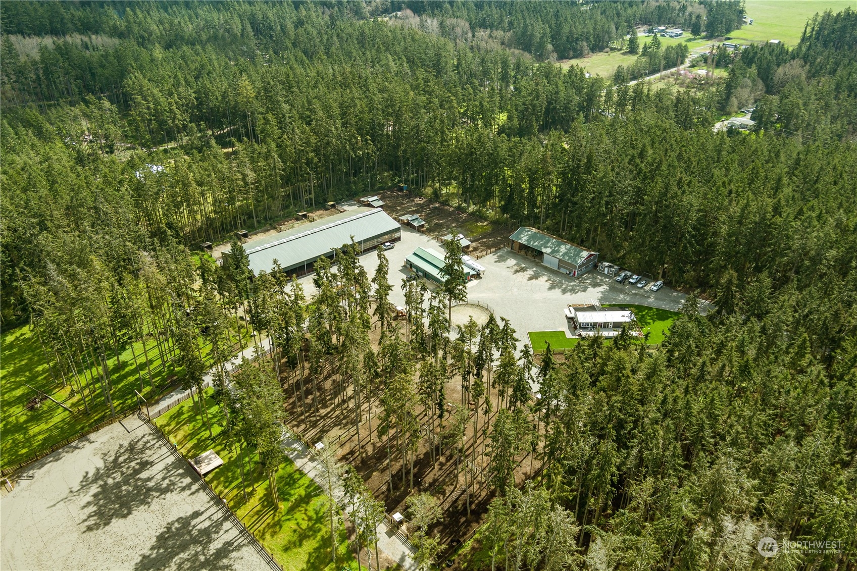 4656 Monkey Hill Road Oak Harbor, WA 98277 - Photo 2 of 40 a view of a yard with a tree